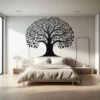 The Eternal Family Tree Wall Mural in a bedroom. Black wall sticker on a white wall above a bed in well lit bedroom.