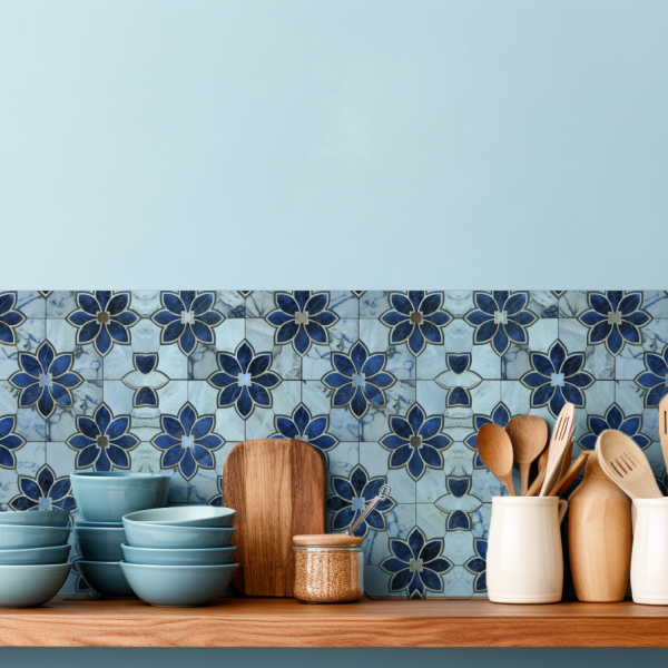 Moroccan Zellige Blue Floral tile backsplash installed on the wall of a kitchen with wooden countertop.